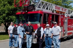 George and other fire apparatus enthusiasts documenting apparatus Stickney.