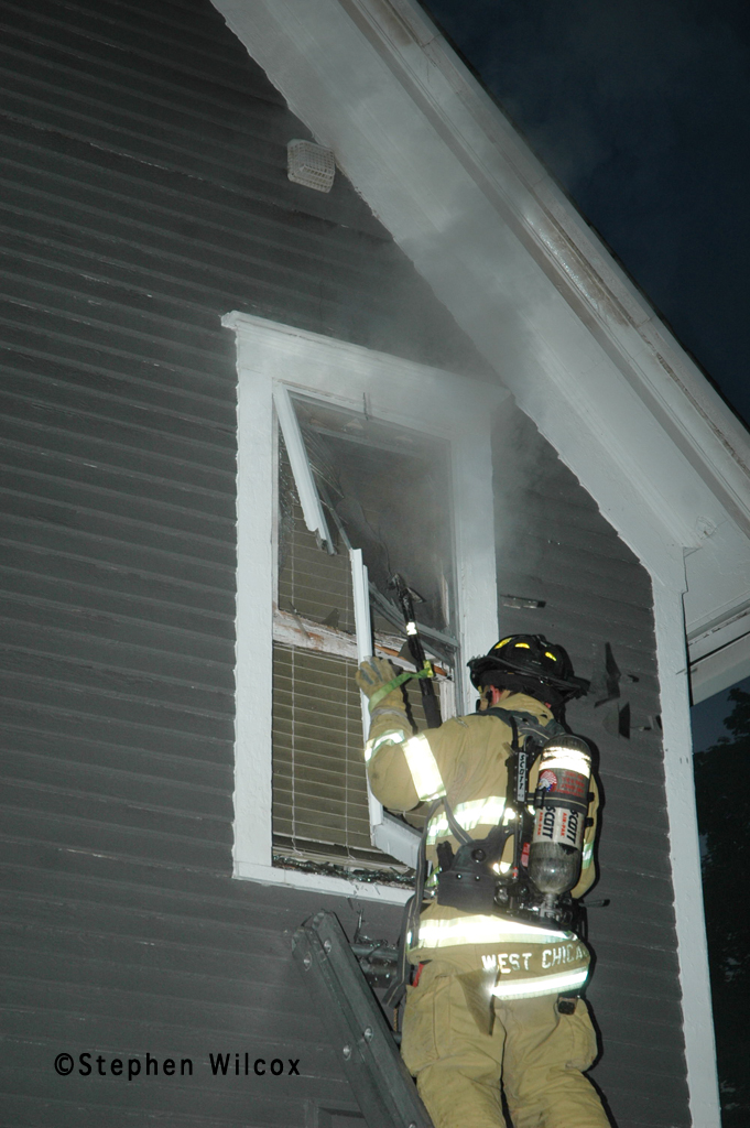 Wheaton house fire on Ellis 6/17/11 firefighter vents window VENT, ENTER, SEARCH