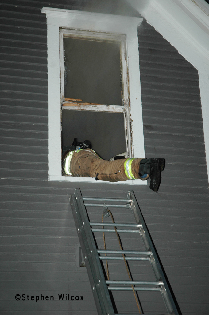 Wheaton house fire on Ellis 6/17/11 firefighter entering window VENT ENTER SEARCH
