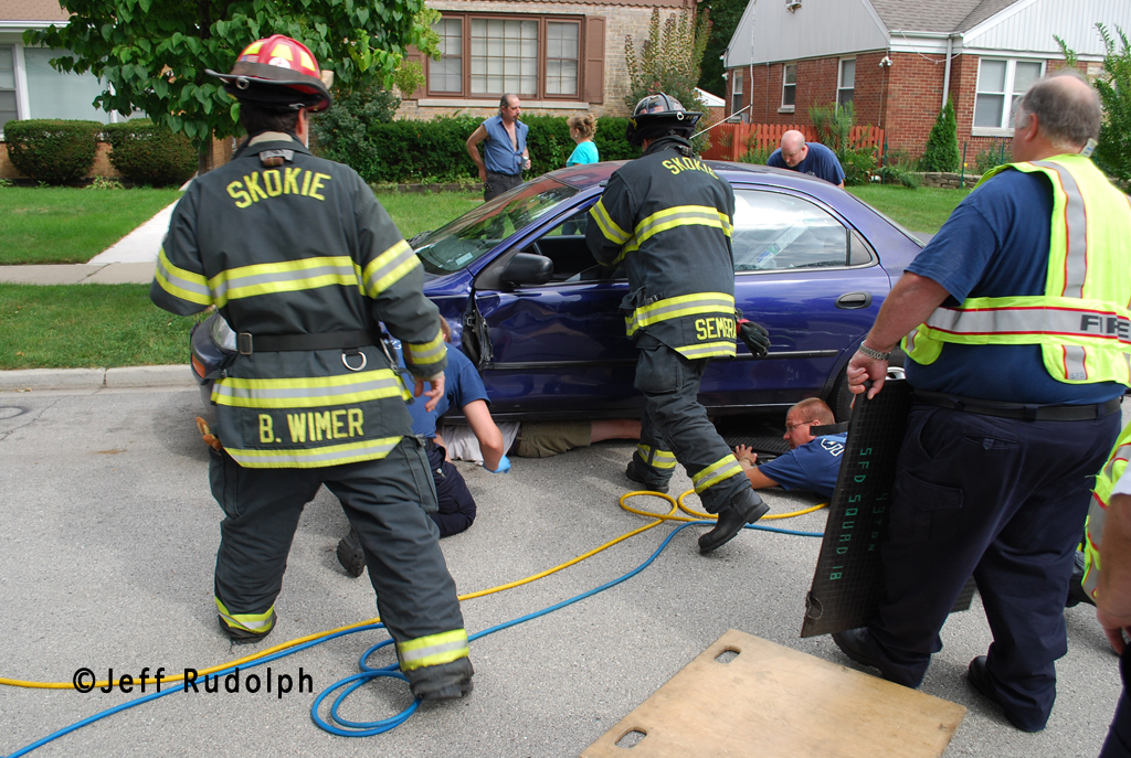 Skokie Fire Department man stuck under a car 8-30-11