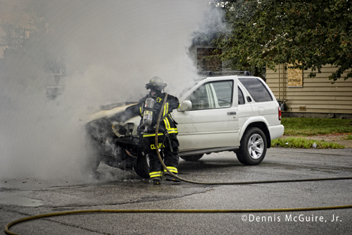 car fire in Harvey Fire Department firefighter