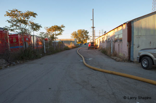 storage yard fire in Wheeling IL at 165 Hintz Road 10-12-12 (fire department) LDH long hose lay