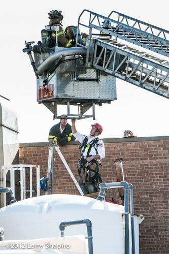 confined space recovery of worker from chemical storage tank in Wheeling IL 11-29-12
