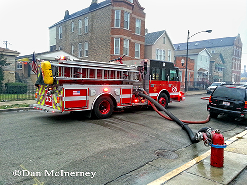 Chicago fire engine pumping at a fire scene