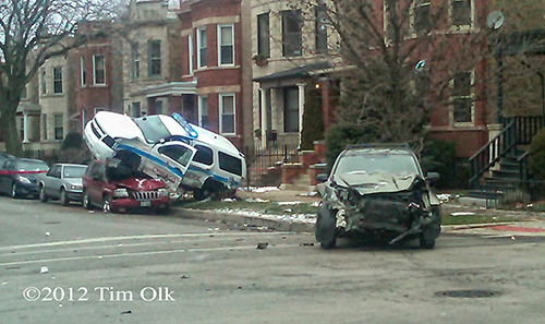 A Chicago Police officer and a civilian were both injured in a crash this afternoon in Logan Square. 