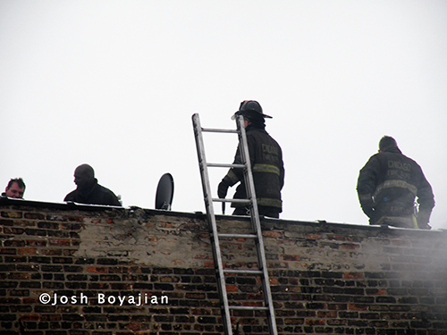 firefighters on the roof