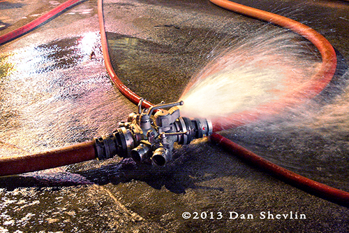 fire department hose in the street