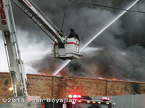 Chicago Squad 5 Snorkel working at extra alarm fire
