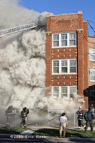 Chicago firefighters battle smokey building fire