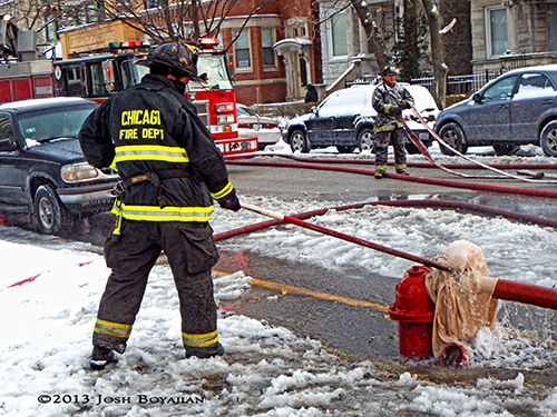 Chicago fireman thaws frozen fire hydrant