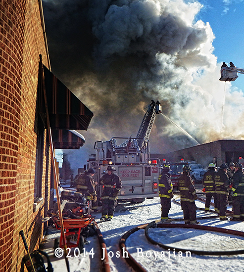 Chicago firemen battle frigid 3-11 alarm warehouse fire 1-3-14.