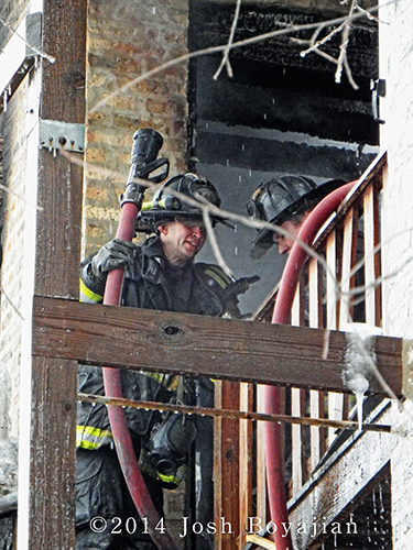 Chicago firefighters fight winter house fire