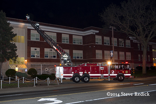 Seagrave aerial ladder at night