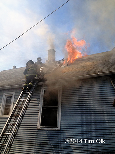 firemen leave roof after venting flames