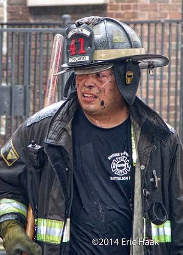 fireman with dirty face after fighting a fire