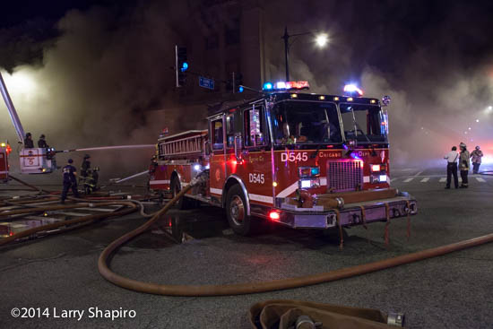 smokey Chicago fire scene with fire engine