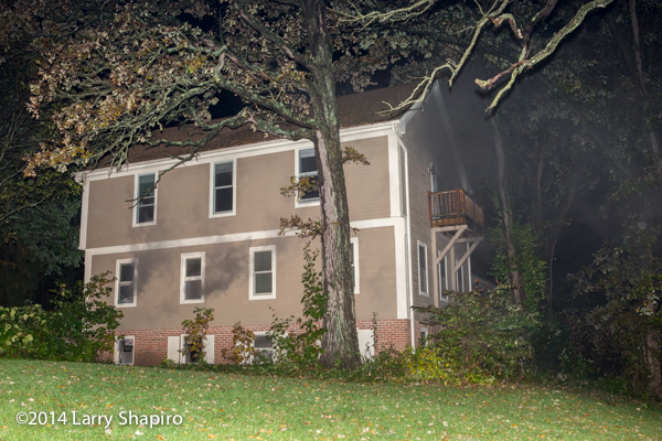 smoke from house fire at night