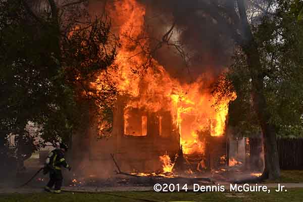 house fully-engulfed in fire