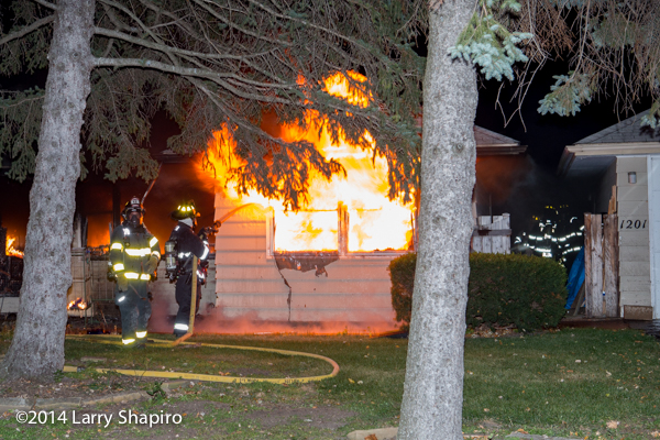 fully engulfed house fire