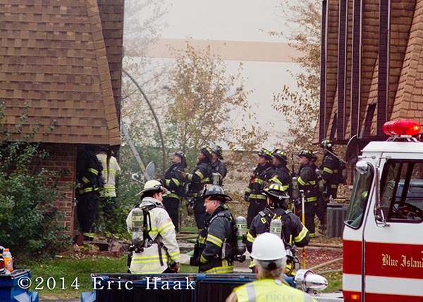 firefighters at fire scene