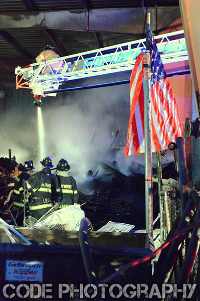 firemen with American flag