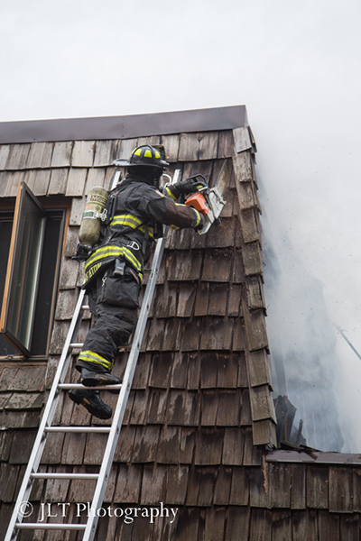 house fire with mansard roof