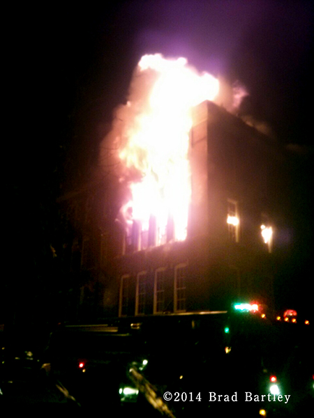 massive flames from building fire in Chicago at night