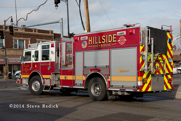 Hillside fire truck at fire scene