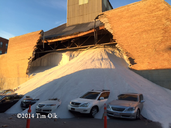 tons of salt crushes cars after wall gives way