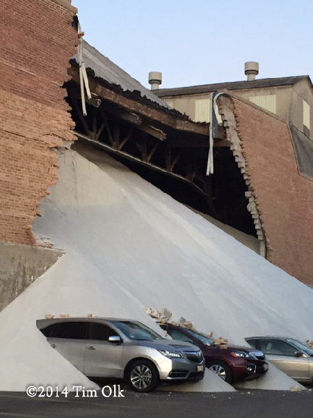 tons of salt crushes cars after wall gives way
