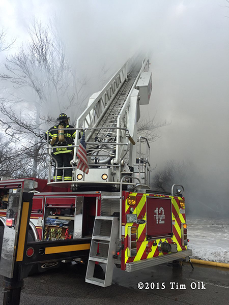 Peirce tower ladder at smokey fire scene