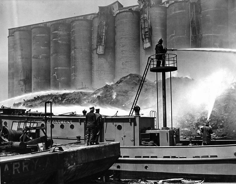 historic Chicago fire scene with fire boats
