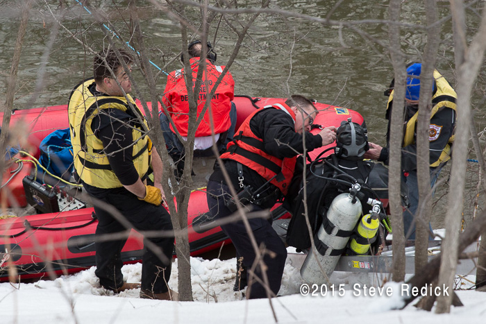 fire department divers working in a river