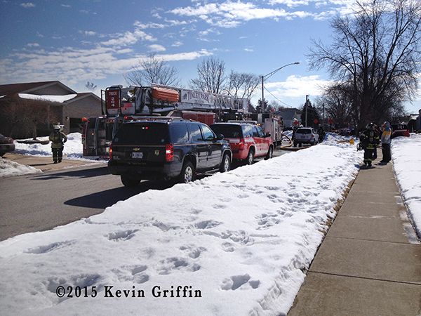 Firemen in Tinley Park (IL) at the scene of a house fire 3/7/15