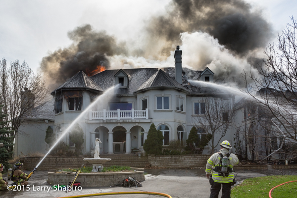 mega mansion engulfed in flames