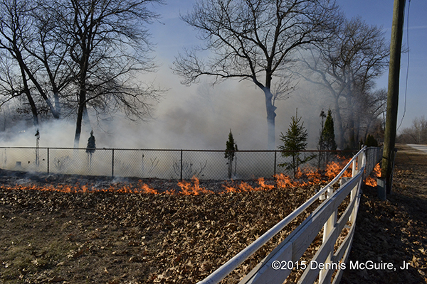 brush fire encroaches on homes