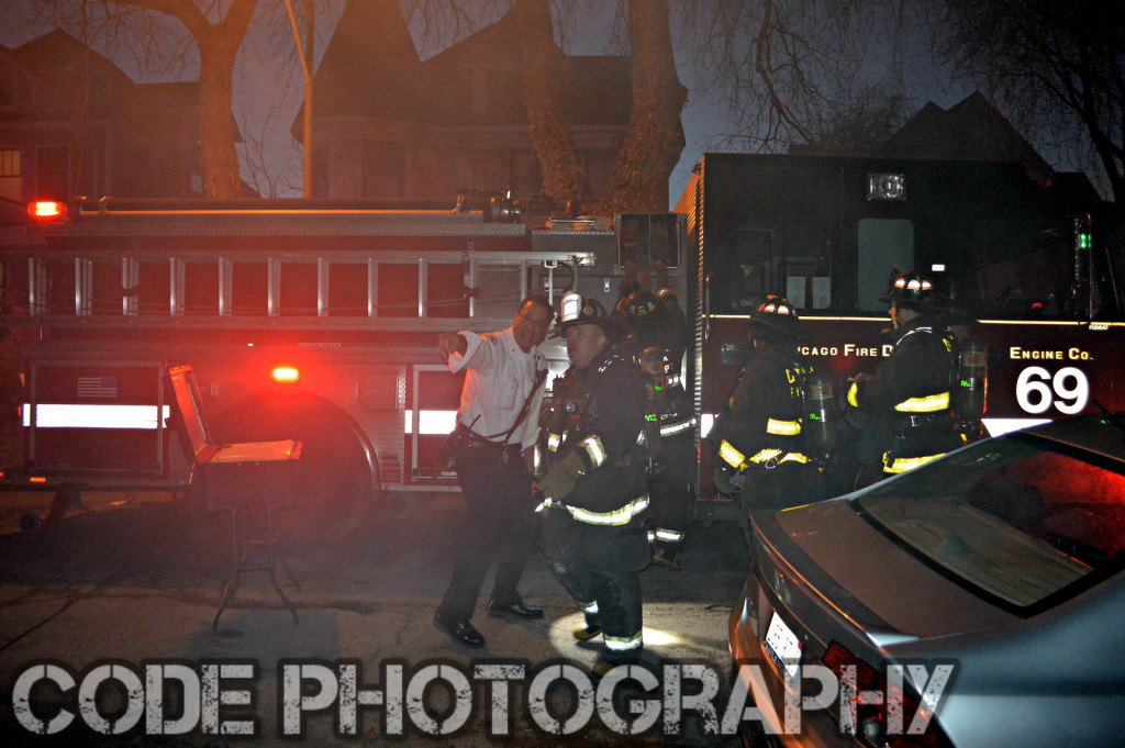 firemen at night fire scene