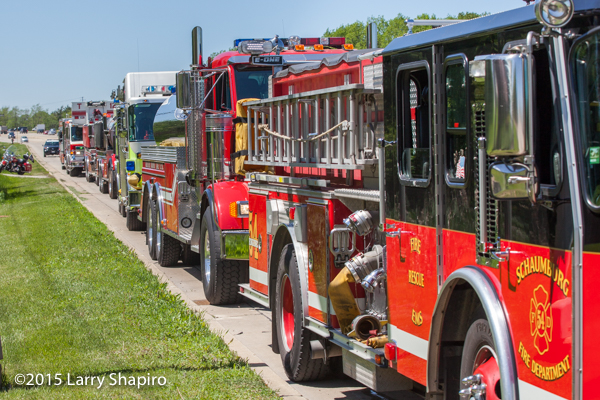line of fire trucks staged