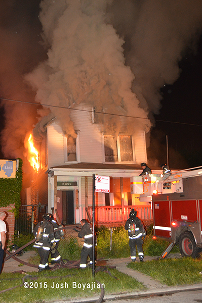 house full engulfed in fire at night