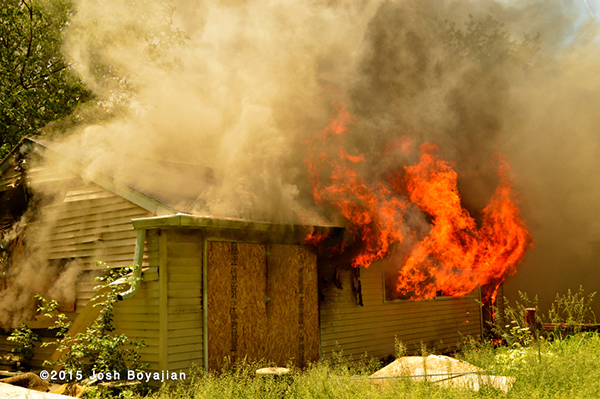 vacant house fully engulfed in fire