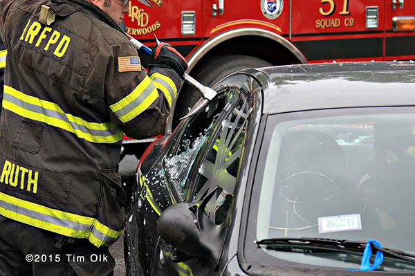 fire department demonstration of cutting apart a car