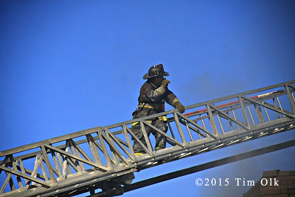 fireman on aerial ladder