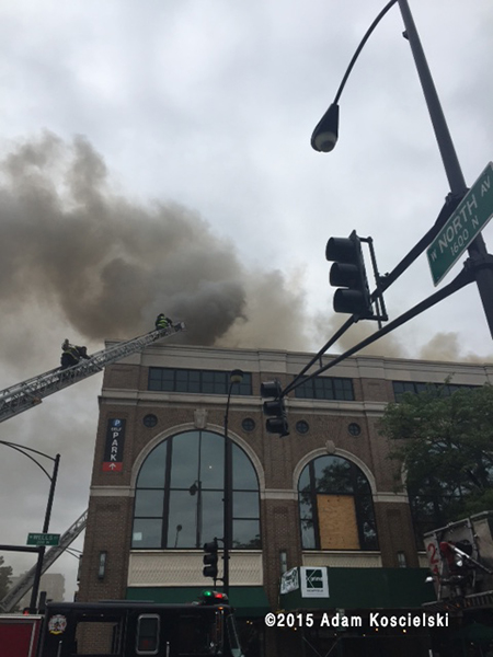 smoke from roof of burning building