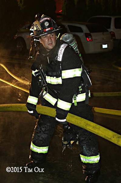fireman at night fire scene