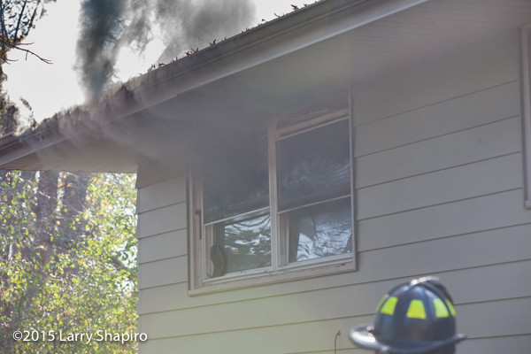 smoke from window at house fire