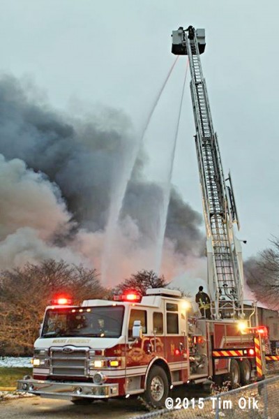 Mount Prospect FD tower ladder at fire scene 