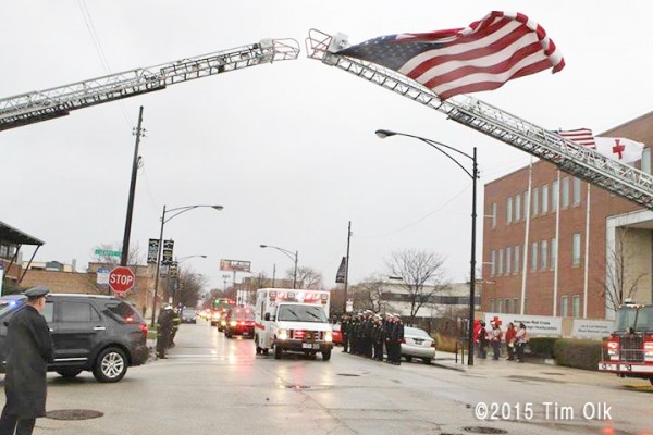 firefighters honor a fallen brother
