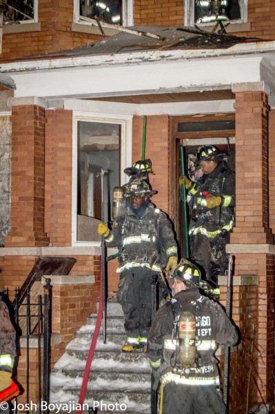 Chicago firefighters leave vacant building after a fire
