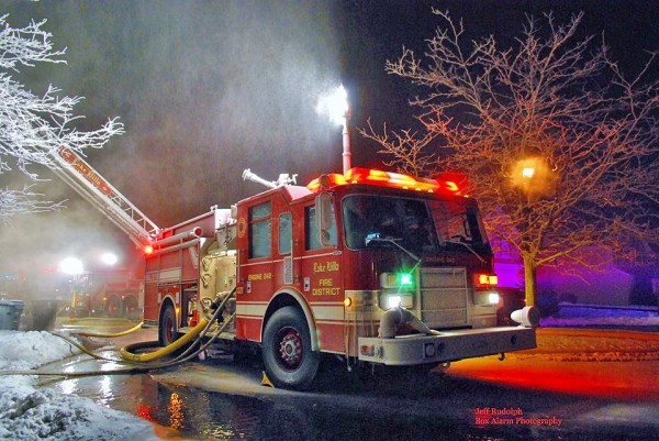 fire engine coated with ice at fire scene