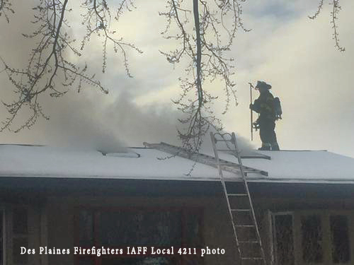 firefighters on roof of house to vent during fire